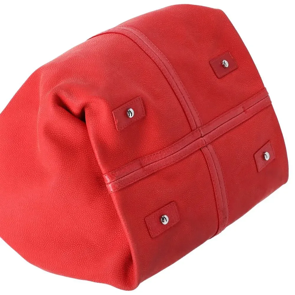 CHANEL Red Caviar Leather Camellia Drawstring Bag with Pouch